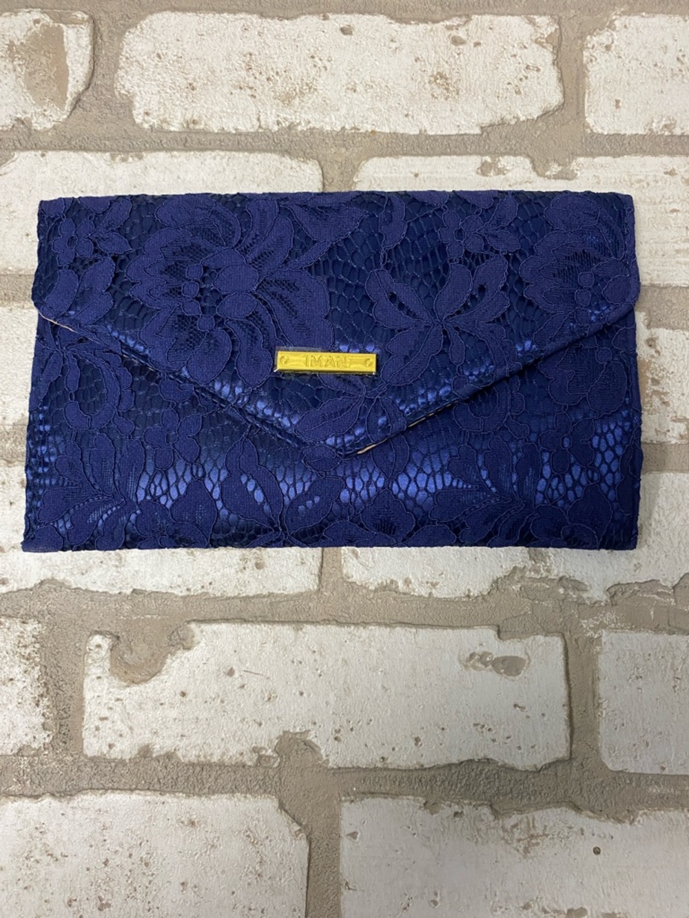IMAN Navy Blue Lace Envelope Clutch with Gold Plaque